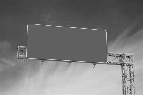 A magnifying glass. . Overhead sign structure design example
